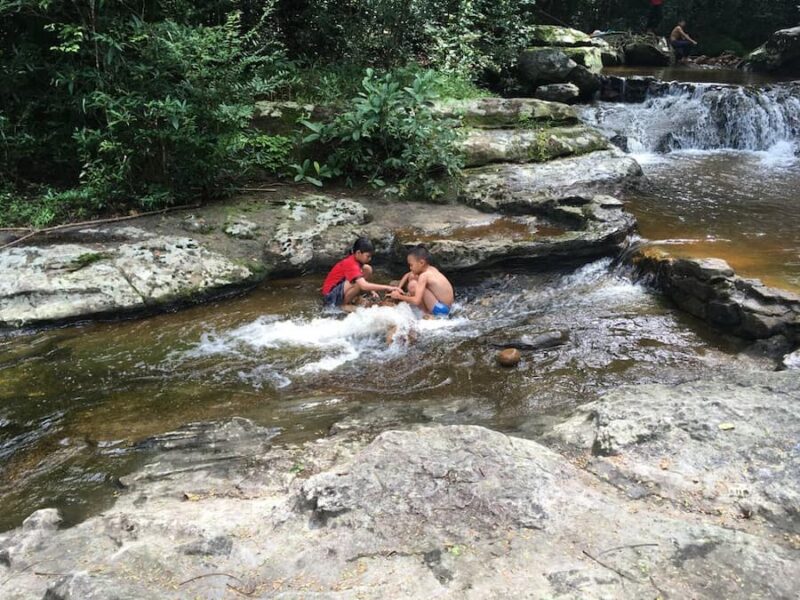 Waterpret Kham Hom waterval © Robert Merks